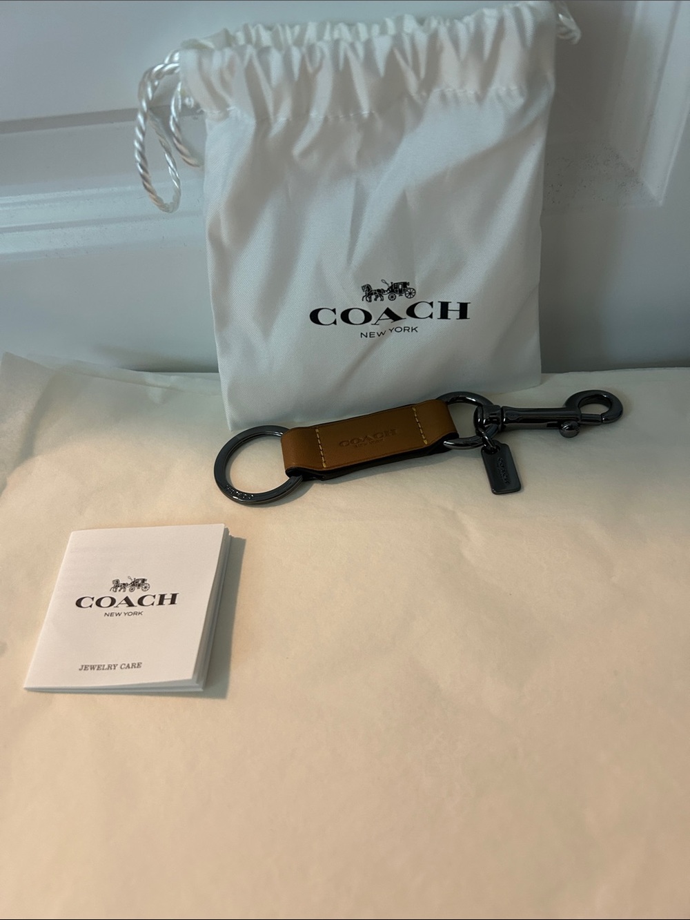 COACH Men’s Tan Leather Key Ring with Gunmetal Hardware